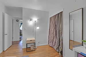 Hallway featuring light hardwood / wood-style floors