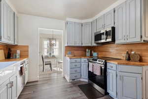 The kitchen and dining area are spacious and charming, ideal for holiday gatherings