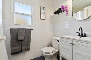 Remodeled Bathroom featuring NEW Tile and soaking tub