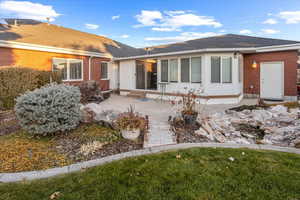 Back of house with a patio