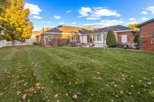 View of front of house with a front lawn