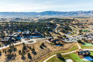 Birds eye view of property with a mountain view