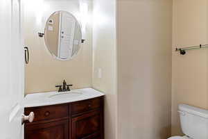 Bathroom with vanity and toilet