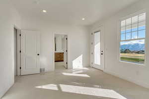 Primary bedroom with private balcony