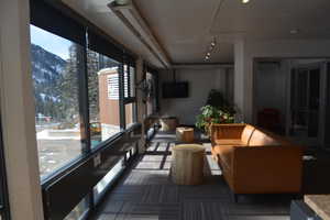 TV room with beautiful mountain views