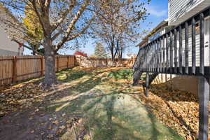 View of yard with a deck