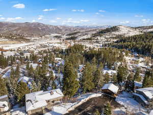 Snowy aerial view with a mountain view