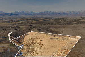 Drone / aerial view featuring a mountain view