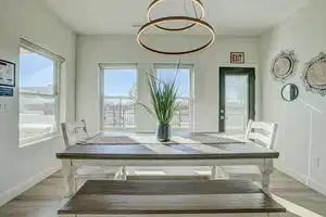 Unfurnished dining area featuring plenty of natural light and light wood-type flooring