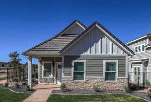 View of front of property with a front lawn