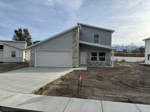 View of front of house with a garage