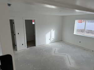 Empty room with a textured ceiling