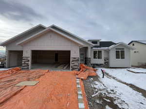 View of front of home with a garage