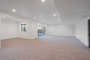 Empty room featuring carpet flooring