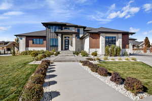 View of front of property featuring a front yard