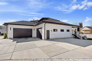 View of front of home with a garage