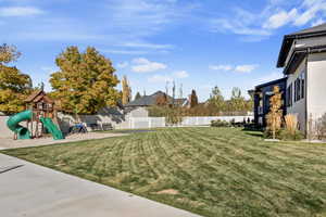 View of yard featuring a playground