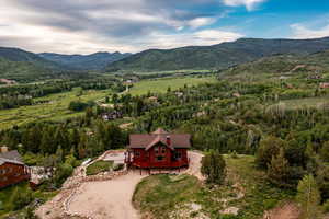 Birds eye view of property featuring a mountain view