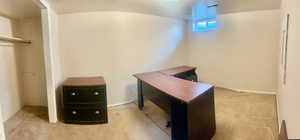 View of carpeted home office