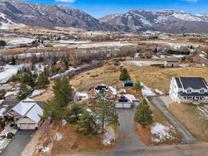 Snowy aerial view with a mountain view