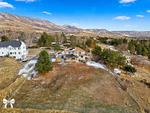 Birds eye view of property featuring a mountain view