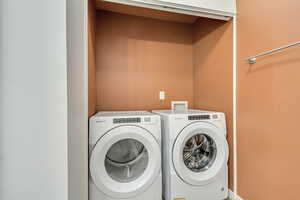 Clothes washing area with washing machine and clothes dryer