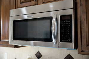 Room details featuring tasteful backsplash