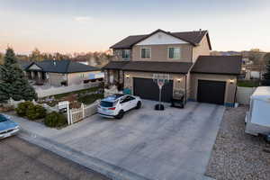 View of front property featuring a garage