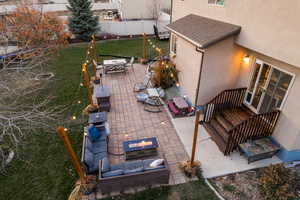 View of patio / terrace with a fire pit