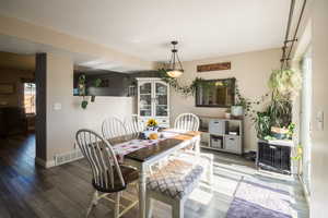 Dining room with hardwood / wood-style floors