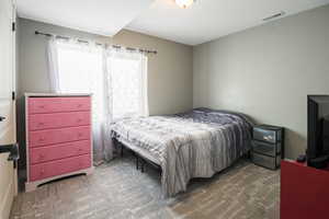 Bedroom with carpet