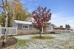 View of front of house with a front lawn