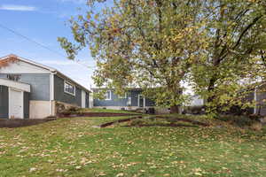 View of yard with central AC unit