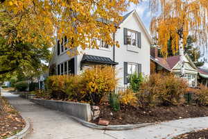 View of property - corner exterior and private yard.