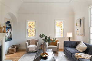 Living room featuring large windows.