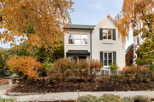 Side view of home and private fenced yard.