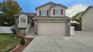 View of front of home with a garage