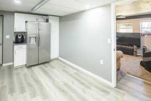 Kitchen with room for dining with second laundry behind closet doors