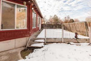 View of snow covered property