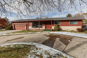 Ranch-style home with a garage