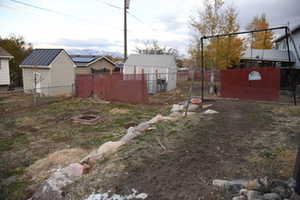 View of yard with a fire pit