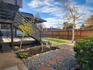 View of yard featuring a deck