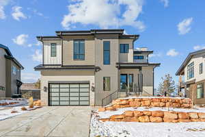 View of front of home with a garage