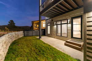 Yard at dusk with a patio