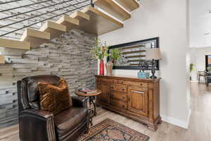 Living area featuring light hardwood / wood-style flooring