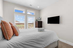 View of carpeted bedroom