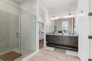 Bathroom with vanity and walk in shower