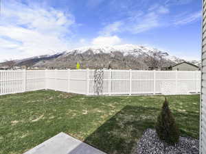 View of yard with a mountain view