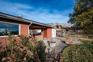 Back of house with a mountain view