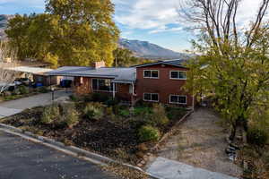 View of front of property with a mountain view